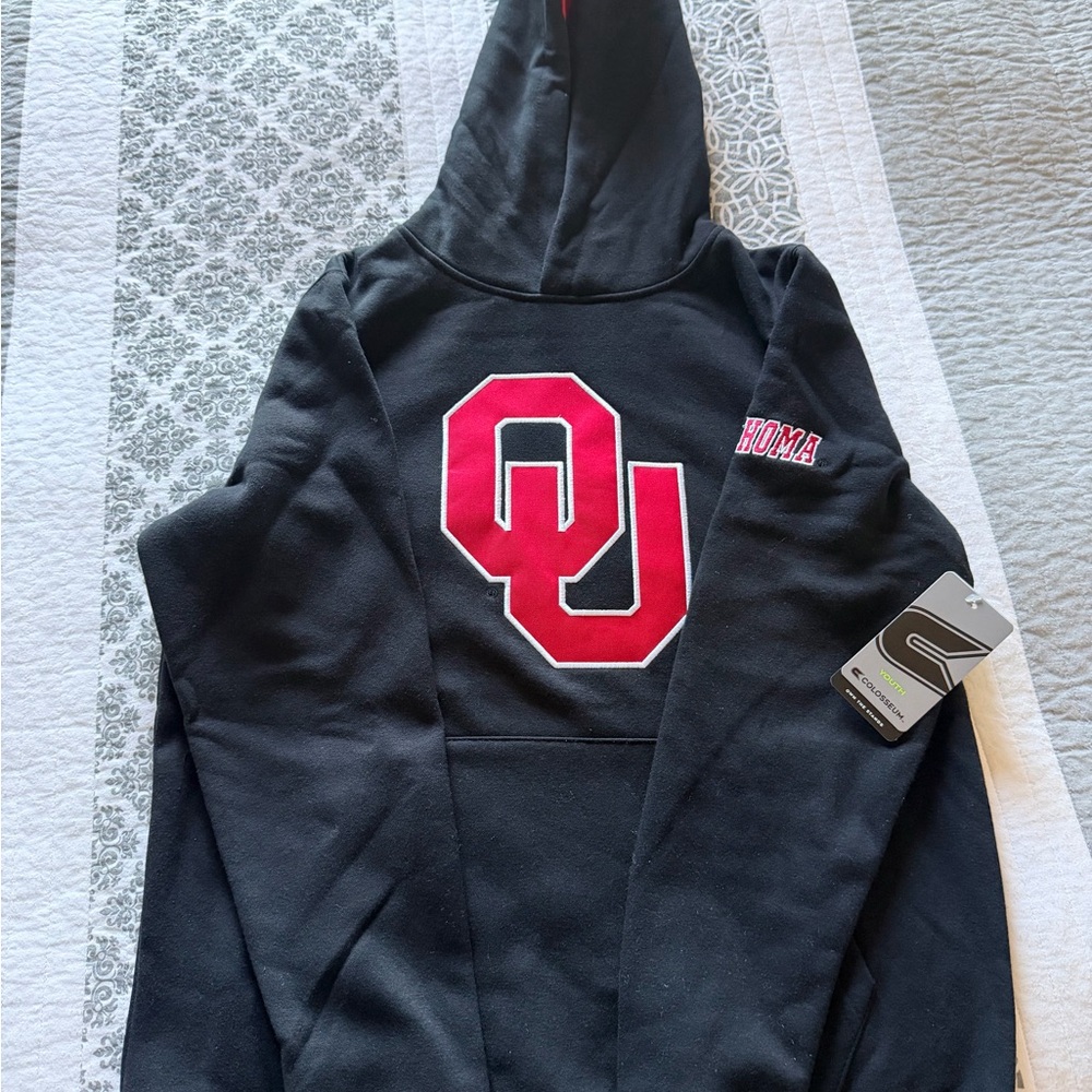 Colosseum Black Hoodie with Maroon OU Logo. Youth size L. New with tags.